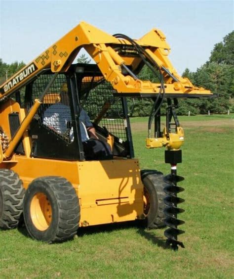 skid steer with post hole digger|truck mounted post hole digger.